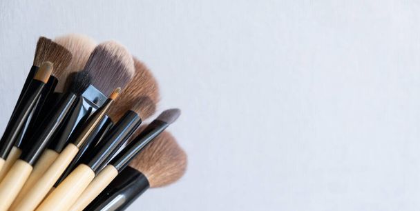 Set of makeup brushes on a light background. Variable focus. - Photo, Image