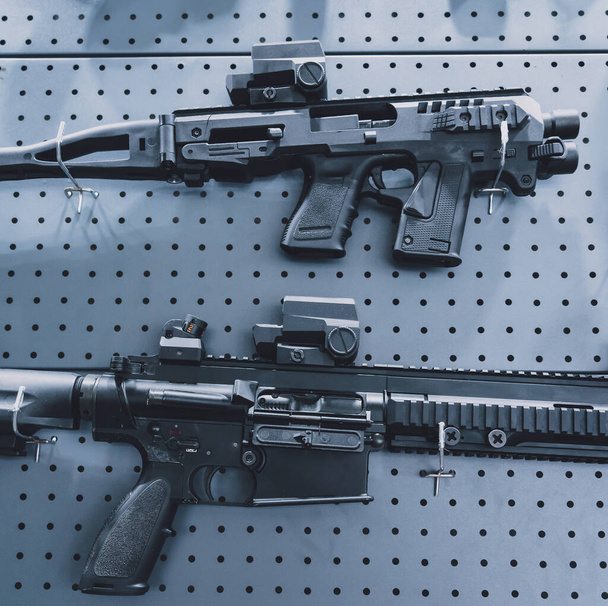 Collection of rifles and carbines on the wall. - Photo, Image