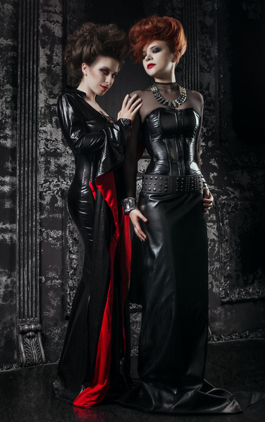 Two women in fetish costumes - Φωτογραφία, εικόνα