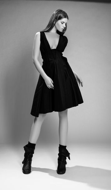 Fashion model woman in black dress - Foto, Imagen