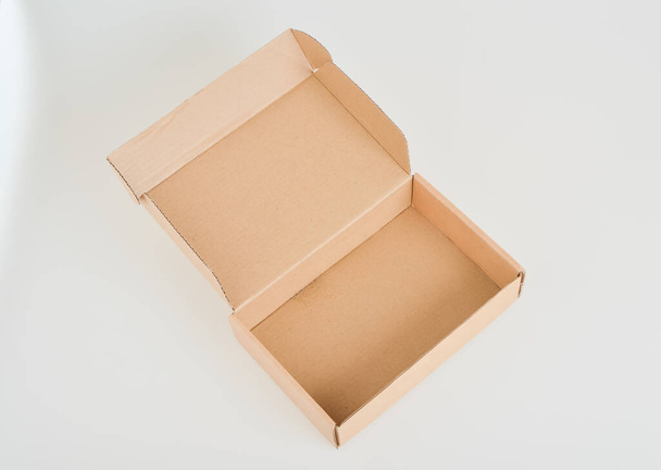 Brown cardboard box isolated on a white background - Zdjęcie, obraz