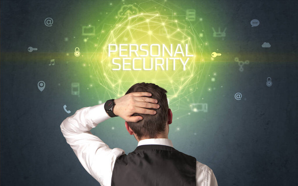 Rear view of a businessman with PERSONAL SECURITY inscription, online security concept - Fotoğraf, Görsel