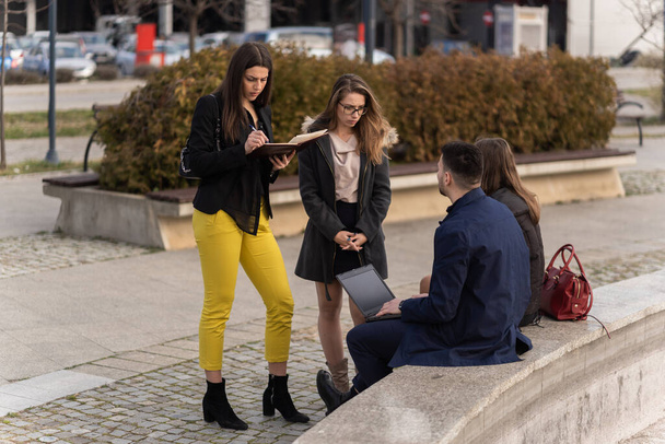 Group of young business people are having a serious conversation - Photo, Image