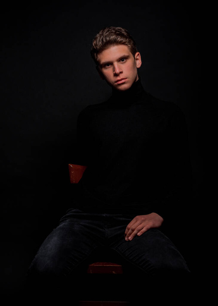 Studio body shot of a trendy young man wearing modern style clothes - Foto, immagini
