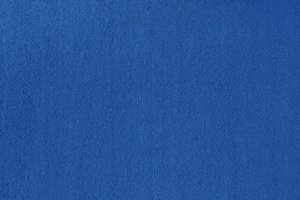 Tmavě modrá bavlněná tkanina textura pro pozadí, přírodní textilní vzor. - Fotografie, Obrázek