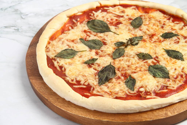 Photo of freshly cooked Margharita Pizza. - Photo, Image