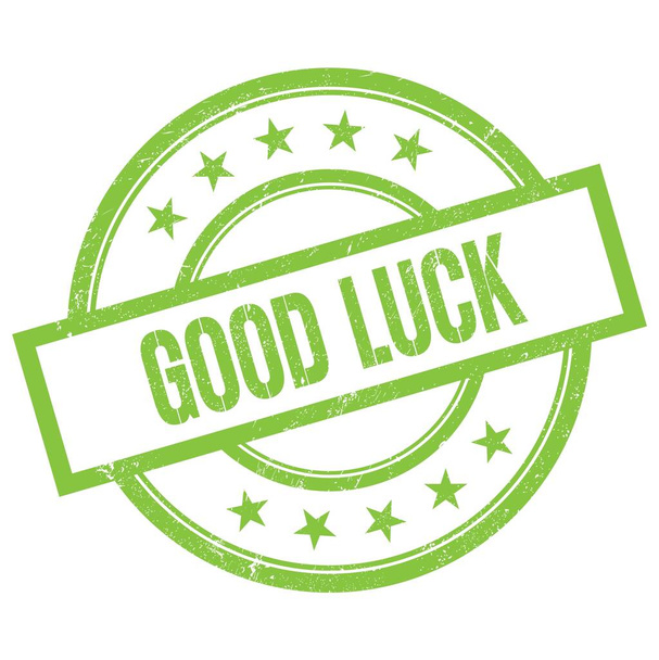 GOOD LUCK text written on green round vintage rubber stamp. - Photo, Image