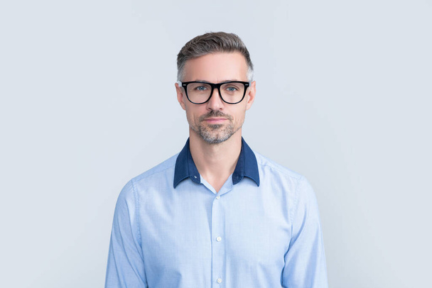 mature boss in office shirt wearing glasses. - Valokuva, kuva