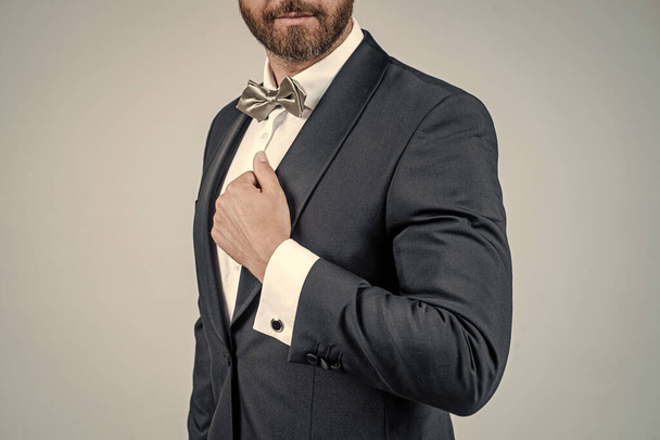 male beauty and fashion. menswear and formalwear. bride groom. esthete wear bow tie. successful mature aristocrat. cropped man in tuxedo. bearded businessman with bristle. - Valokuva, kuva