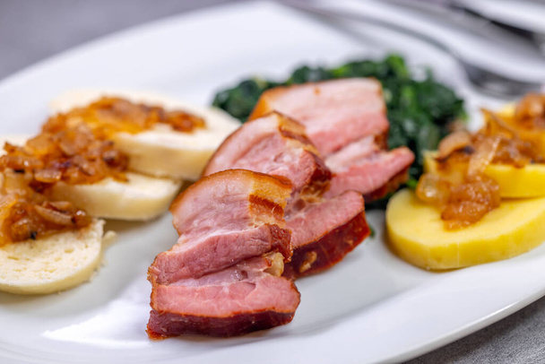 smoked flank with potato and bread dumplings and spinach - Photo, Image