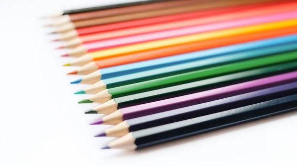 A set of colored pencils isolated on a white background in banner format. Place for text. - Фото, изображение