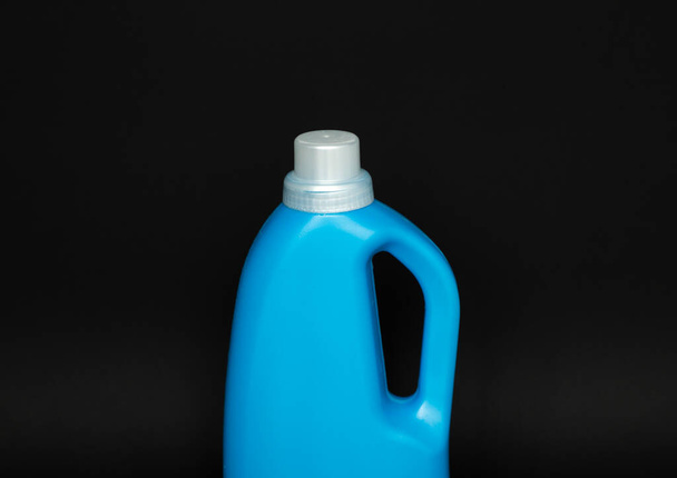 Blue plastic bottles of cleaning products. Laundry container, merchandise template - Photo, Image