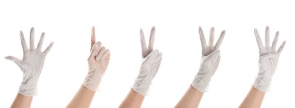 Σετ χειρονομιών σε ιατρικά γάντια που απομονώνονται σε λευκά - Φωτογραφία, εικόνα
