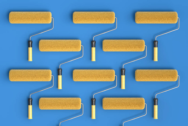 Set of paint rollers for painting walls and renovating apartment on blue background.. 3d render concept of DIY repair in room and renovation banner - Photo, image