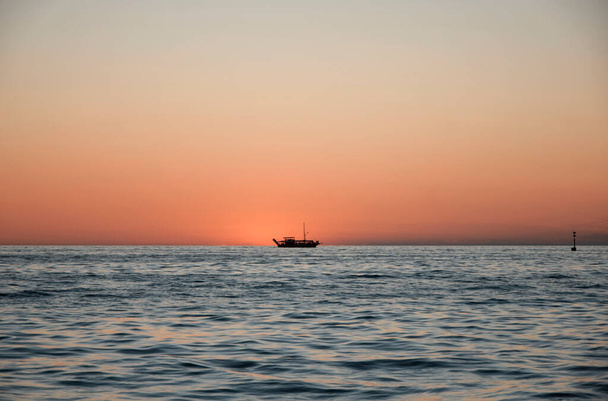 Vessel sailing in Adriatic sea with sunset - Photo, Image