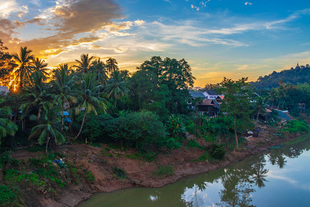Sunset at panorama of the landscape Mekong river and Luang Prabang city in Laos world tour in Southeast Asia. - Foto, Imagem