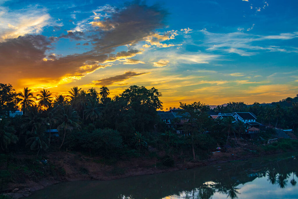 Sunset at panorama of the landscape Mekong river and Luang Prabang city in Laos world tour in Southeast Asia. - Foto, Imagem