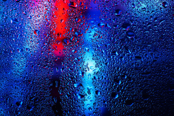 Condensación en la ventana de cristal transparente. Gotas de agua. Lluvia. Textura de fondo abstracta
. - Foto, Imagen
