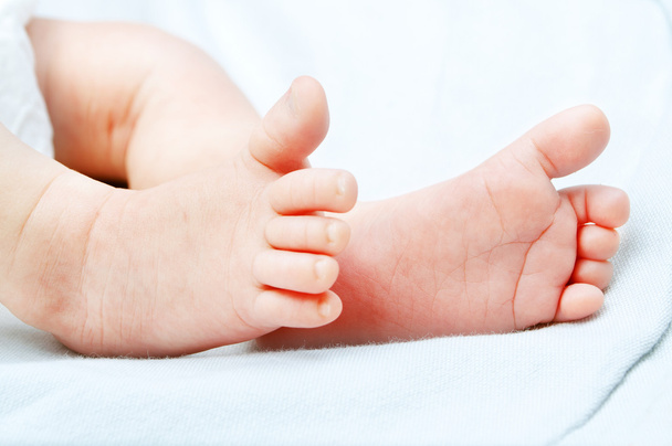 Closeup of a baby feet - Φωτογραφία, εικόνα