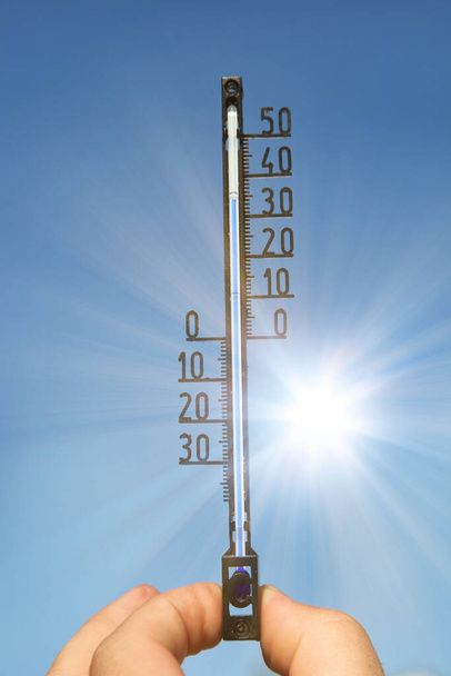 Mercury thermometer. Summer heat or global warming climate change concept. - Foto, Bild