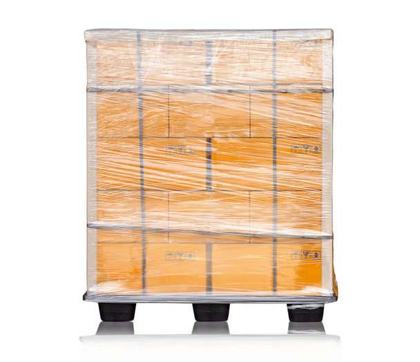 Packaging Boxes Stacked Wrapped Plastic with L-shape Pallet Corrugated Paper Cardboard Angle Corner Edge Protector. Isolated on White. Supply Chain. Cargo Shipment. Shipping Warehouse Logistics. - Photo, Image