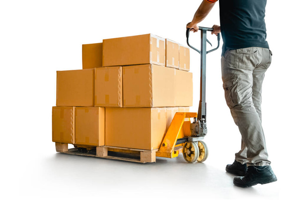 Workers Using Hand Pallet Truck Unloading Packaging Boxes on Pallet. Isolated on White Background. Shipping Warehouse. Delivery. Shipment Goods. Supply Chain. Warehouse Logistics Cargo Transport. - Foto, afbeelding