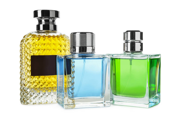 Flessen aromatisch parfum op witte achtergrond - Foto, afbeelding