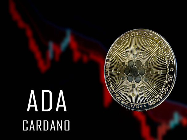 Cardano - ADA munt op geïsoleerde zwarte achtergrond. Concept munt. ADA munt met een crypto valuta trading chart. - Foto, afbeelding