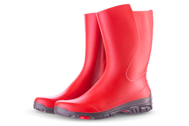 Red rubber boots isolated on white background. Outdoor shoes for trekking. - Photo, Image