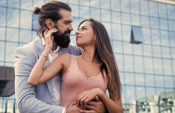 Our feelings. romantic date. relationship. boyfriend and girlfriend outdoor. fashionable loving couple spend time together. togetherness. couple in love. bearded man embrace woman. love and romance. - Fotó, kép