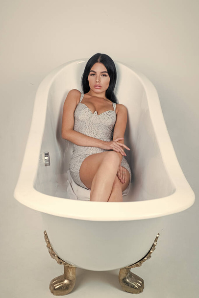 glamour and pretty. woman skincare portrait. sexy woman relax in bathtub. female fashion and beauty. beautiful lady with fashionable makeup. sexual young girl in formalwear. - Zdjęcie, obraz