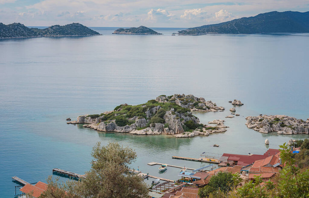 Travel and tourist attractions at Kekova island, Turkey. beautiful view of seascape from Kalekoy Village, Demre, View with boat and islands in sea - Photo, Image