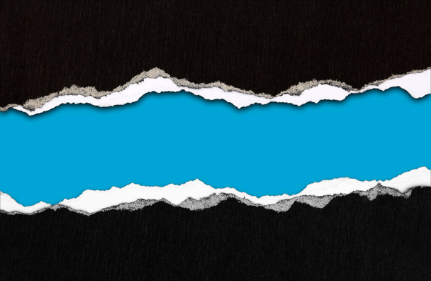 Рваная бумага на синем фоне, место для копирования - Фото, изображение