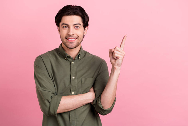 Photo of young happy charming cheerful man point finger empty space sale news isolated on pink color background. - Fotó, kép