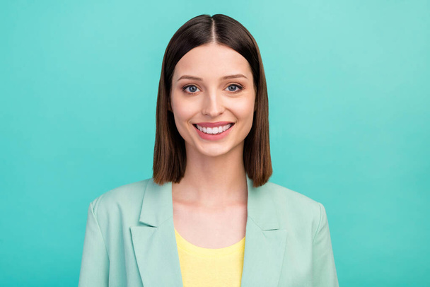 Photo of optimistic young brunette lady wear blazer isolated on cyan color background. - Foto, Bild