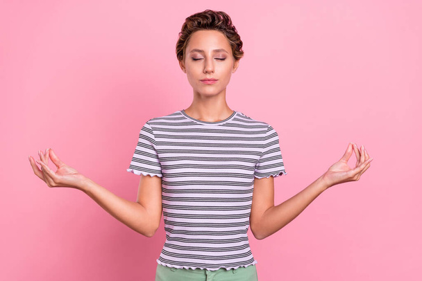 Photo of cute millennial short hairdo lady closed eyes wear striped t-shirt isolated on pink color background. - Фото, зображення