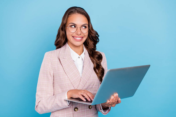 Portrait of attractive smart clever cheery woman hr expert using laptop isolated over bright blue color background. - Valokuva, kuva