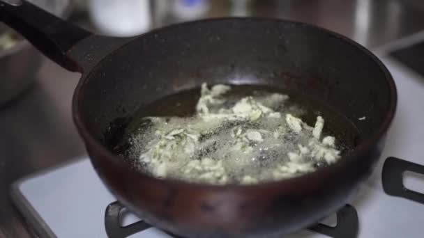 Woman frying tempura of cod buds - Footage, Video