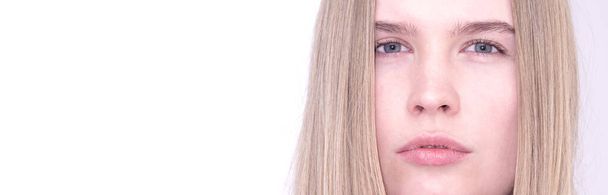 Portrait of a model blue-eyed blonde girl without makeup - Photo, Image