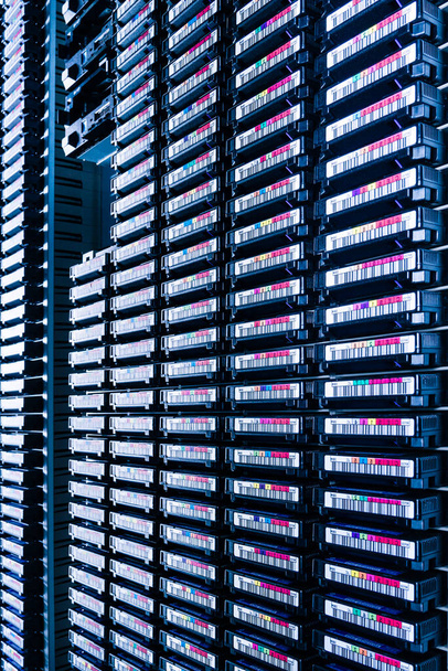data cloud tapes in datacenter racks - Foto, afbeelding