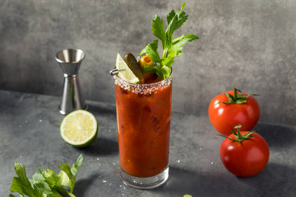 Boozy Refreshing Bloody Mary Cocktail with Vodka and Celery - Fotó, kép