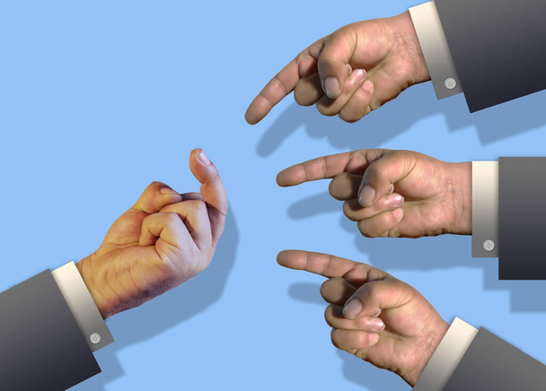 Мужские руки, указывающие на руку с провокационным средним пальцем, выделенным на синем фоне - Фото, изображение
