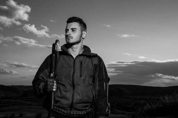 Young hunter. American hunting rifles. Hunting without borders. Hunter with shotgun gun on hunt. Portrait of handsome Hunter - Fotoğraf, Görsel