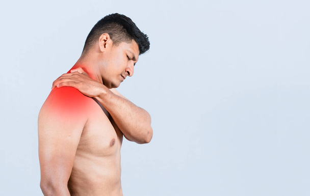 Shirtless person with neck muscle pain, Neck pain and stress concept, Close-up of a man with neck pain, a man with neck pain on an isolated background - Photo, Image
