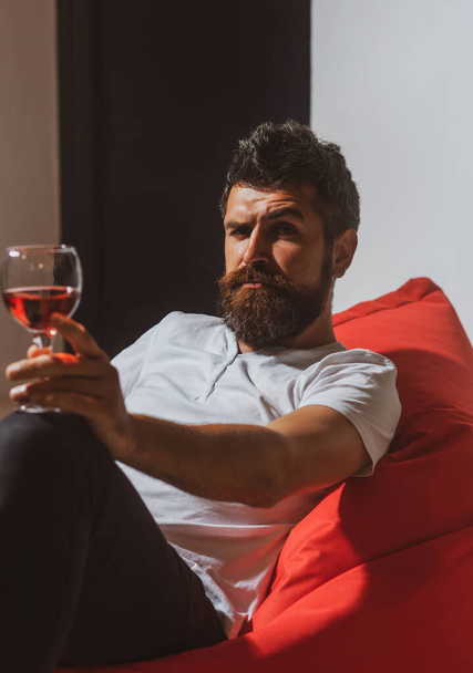 Man in depression drinking wine. Alcohol addiction. Home alone drunk party. Bad habits. Alcohol dependence - Fotoğraf, Görsel