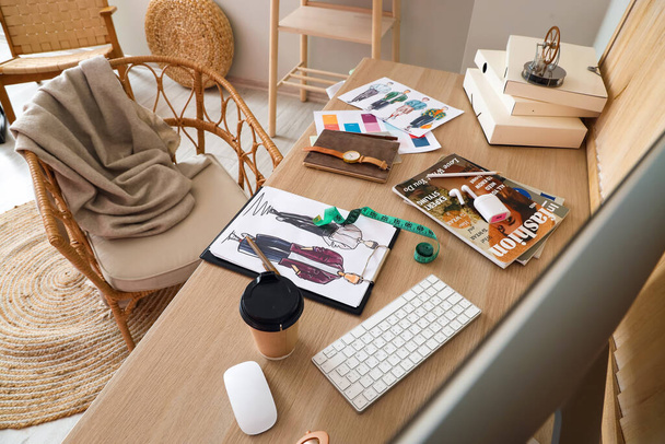 Workplace of clothes stylist in modern studio - Photo, image