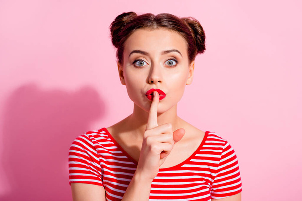Photo of pretty lady finger touch lips demonstrate do not tell gesture isolated on pink color background. - Photo, Image