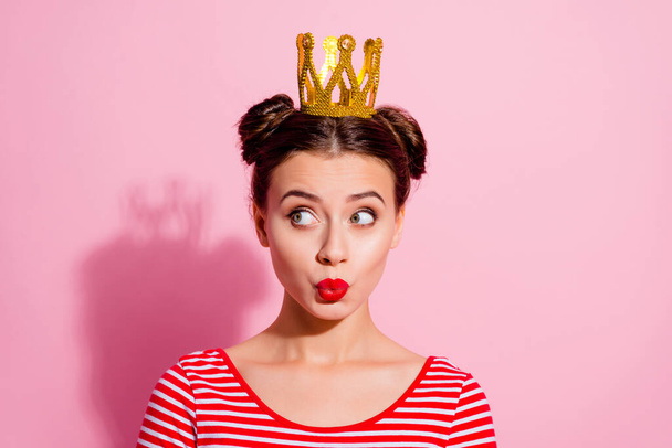 Portrait of young selfish pretty girl with golden tiara on head look empty space thinking isolated on pink color background. - Fotografie, Obrázek