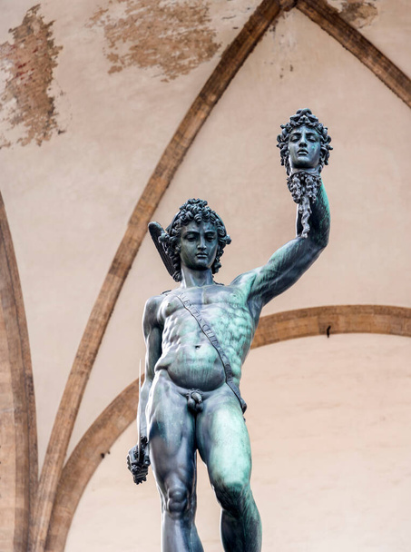 Florence, Italy - April 6, 2022: Sculptures at the Loggia dei Lanzi, a building on a corner of the Piazza della Signoria in Florence, Italy, adjoining the Uffizi Gallery. - Fotó, kép