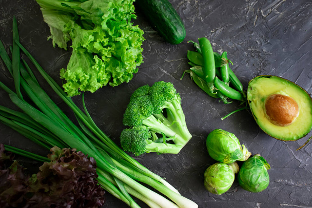 Green vegetables on old background - 写真・画像